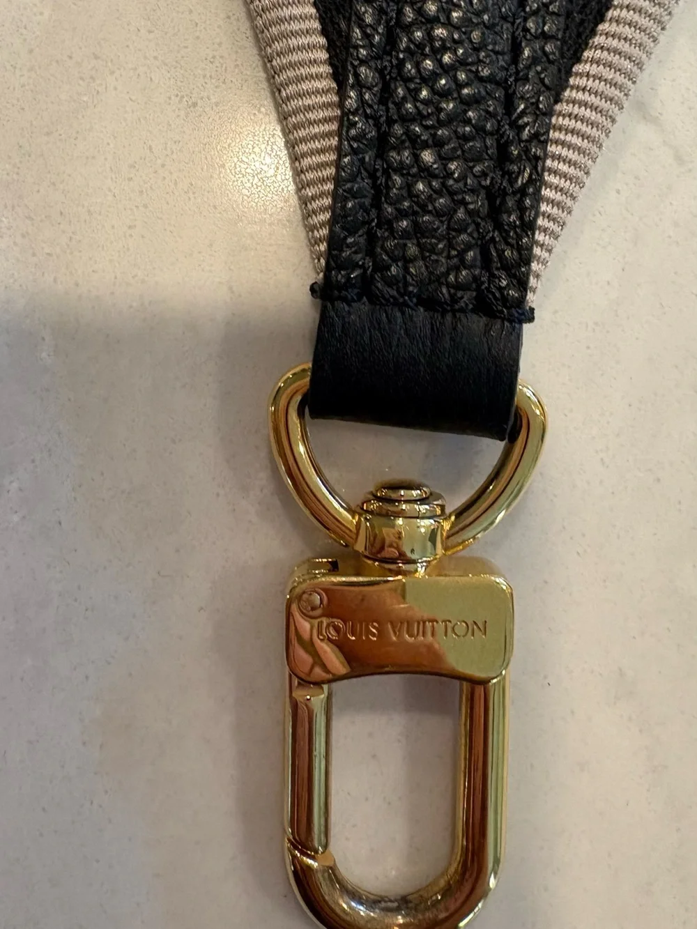 Authentic Louis Vuitton Black Strap with Gold Hardware
